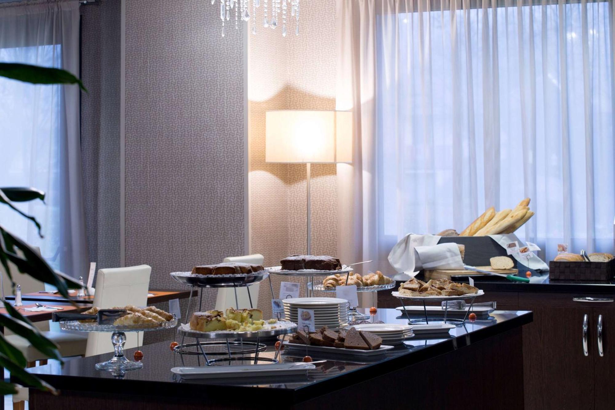 ฮิลตั้น การ์เด้น อิินน์ มิลาน มัลเพนซ่า Hotel ซอมมา ลอมบาร์โด ภายนอก รูปภาพ